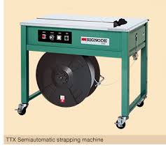 TTX TABLE TOP STRAPPING MACH.